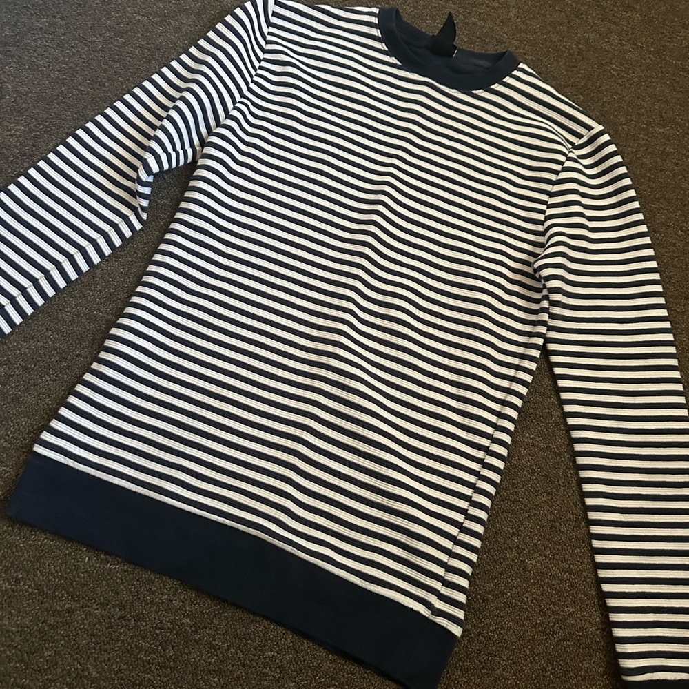 dark navy blue & white striped sweater. fits small.